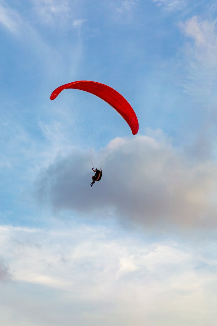 Experience the thrill of paragliding marrakech against a vibrant Brazilian sky.